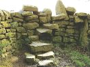 138 Hept stile above village